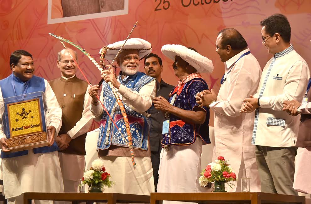 The Prime Minister, Shri Narendra Modi at the inauguration of the National Tribal Carnival-2016, in New Delhi on October 25, 2016. The Union Minister for Tribal Affairs, Shri Jual Oram, the Minister of State for Environment, Forest and Climate Change (Independent Charge), Shri Anil Madhav Dave and the Minister of State for Home Affairs, Shri Kiren Rijiju are also seen.